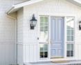 close up view of white james hardie siding on a facade